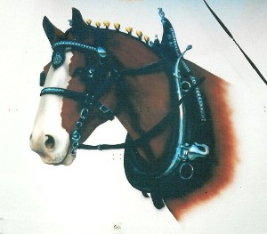 Airbrushed portraits on both sides of the trailer.